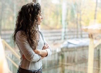 o-MATURE-WOMAN-LOOKING-OUT-WINDOW-facebook